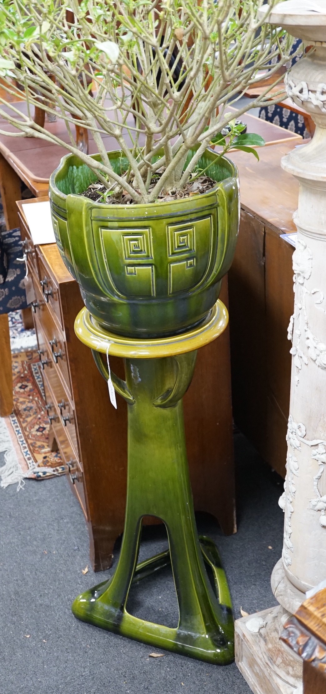 An Art Nouveau Bretby jardiniere on pedestal, 103cm tall excluding plant